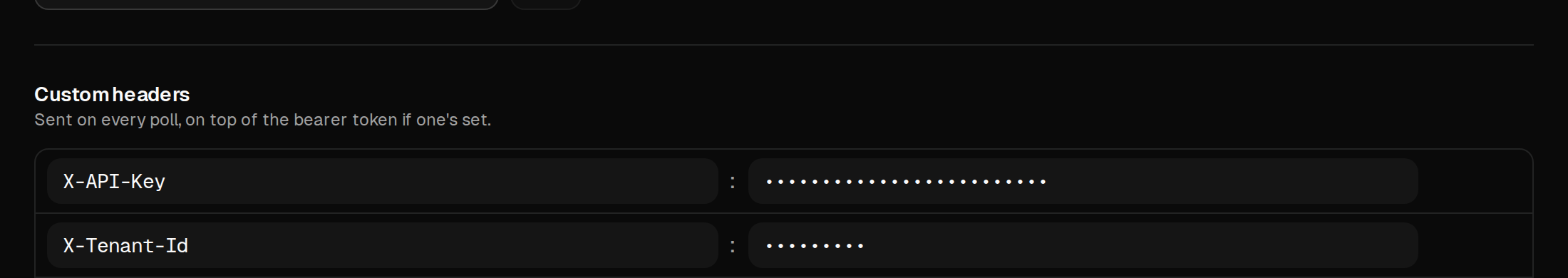 Custom HTTP headers table with an API key header masked